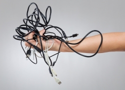 Network switchboards are a mess of cables, which makes it hard to keep cool. Network switchboards are a mess of cables, which makes it hard to keep cool.